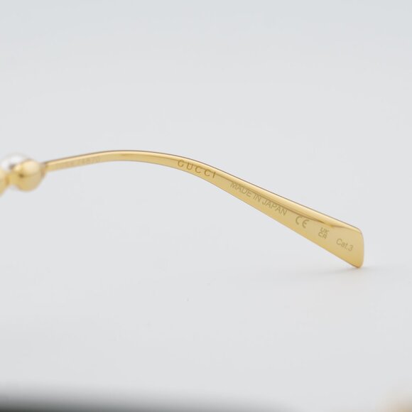 Gucci GG1920S 001 Sunglasses Shiny Gold with White Pearl Cat Eye Frame main image 6